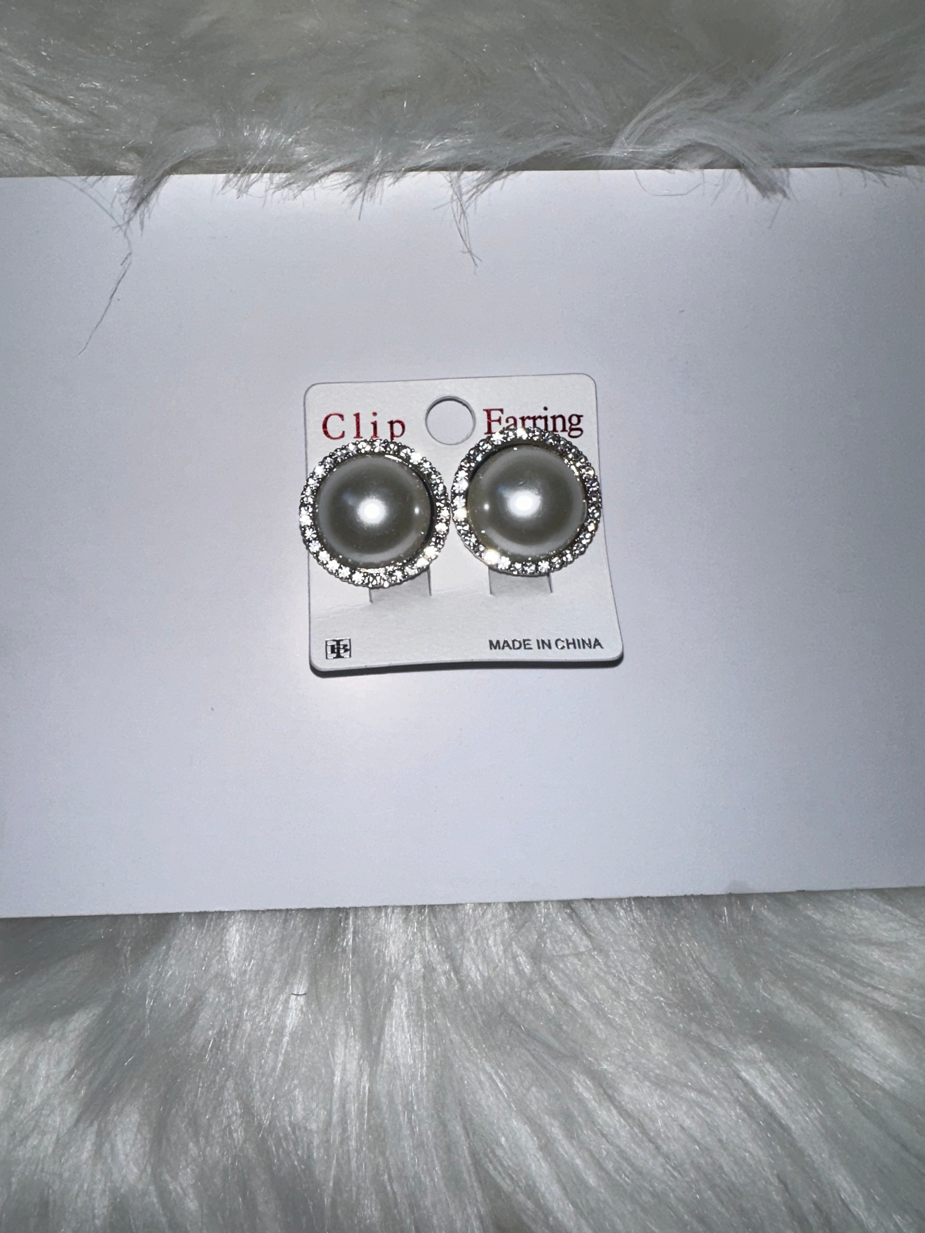 Silver pearl clip on